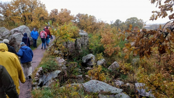 Group walking the trail at Pipestone